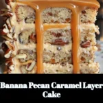 Delicious Banana Pecan Caramel Layer Cake with creamy frosting and pecans.