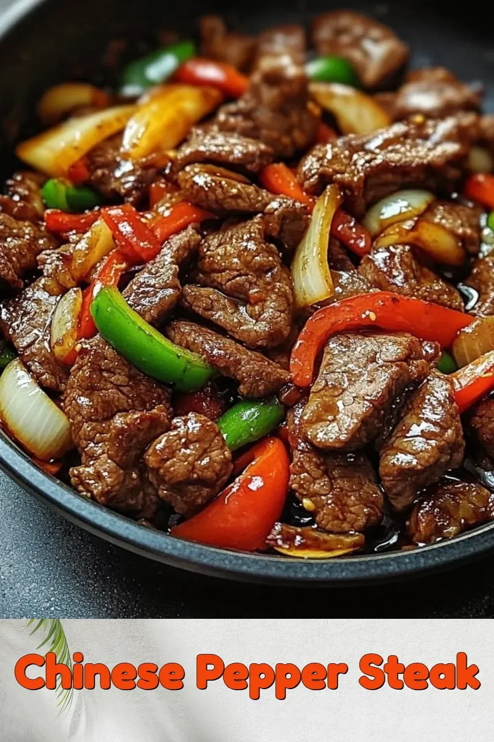 Plate of delicious Chinese pepper steak with bell peppers and onions.