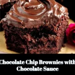 Chocolate chip brownies drizzled with rich chocolate sauce