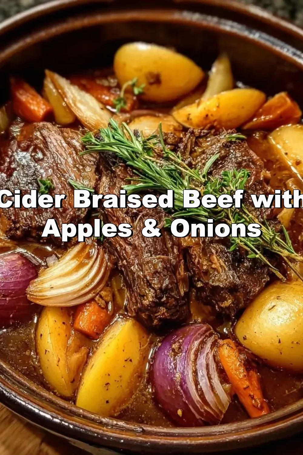 Delicious cider braised beef with apples and onions served on a plate