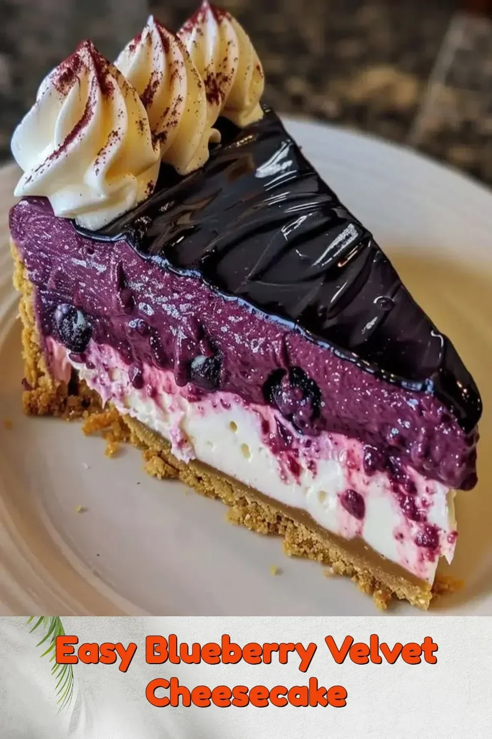 Easy Blueberry Velvet Cheesecake topped with fresh blueberries and a velvety cream layer