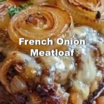 Delicious French onion meatloaf served with caramelized onions and melted cheese