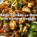 Delicious Garlic Chicken Lo Mein with sautéed vegetables in a bowl