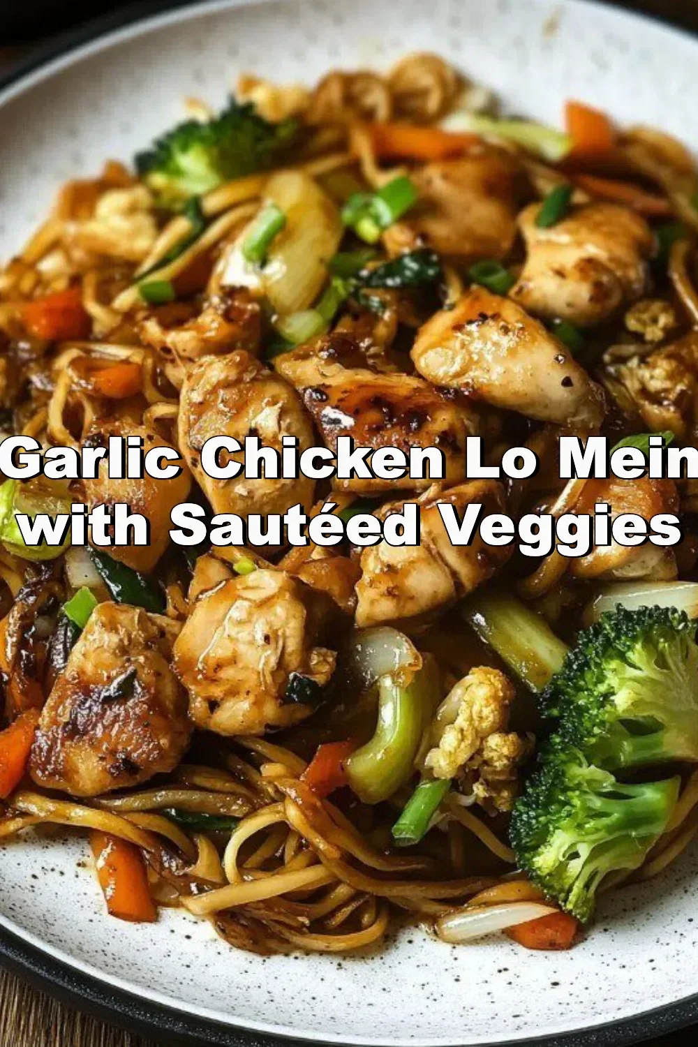 Delicious Garlic Chicken Lo Mein with sautéed vegetables in a bowl