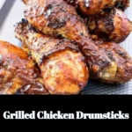 Delicious grilled chicken drumsticks served on a plate
