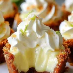 Delicious no-bake mini key lime pies topped with whipped cream and lime zest
