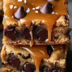 Delicious homemade salted caramel chocolate chip cookie bars on a plate