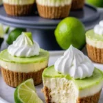 Irresistibly tangy lime cheesecake tartlets on a white plate