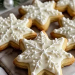 A variety of Italian Christmas cookies arranged on a festive red plate.