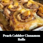 Delicious peach cobbler cinnamon rolls drizzled with icing.