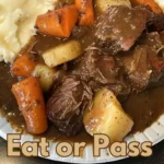 Delicious pot roast with carrots, potatoes, and savory gravy.