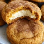 Delicious Pumpkin Cheesecake Snickerdoodles cookies on a rustic table