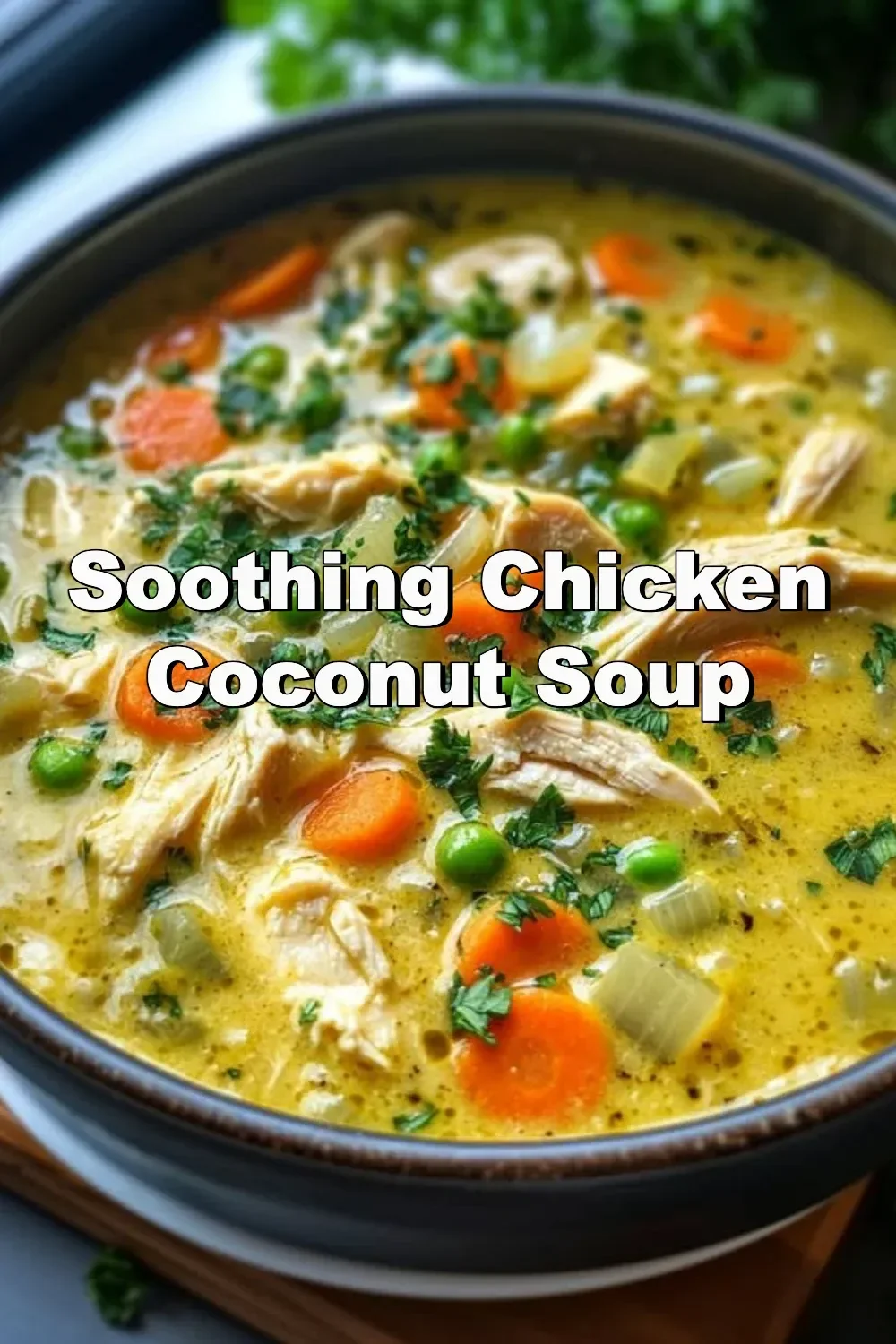 Bowl of soothing chicken coconut soup garnished with fresh herbs.