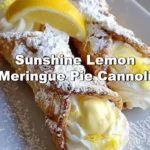 Sunshine lemon meringue pie cannoli filled with creamy lemon filling and topped with meringue.