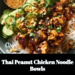 Delicious bowl of Thai Peanut Chicken Noodle Bowls with colorful ingredients