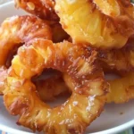 Delicious Tropical Bliss pineapple fritters served with sauce