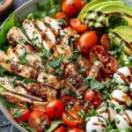 Balsamic Glazed Chicken Salad served in a bowl with fresh greens and vibrant veggies