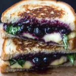 Blueberry Balsamic Grilled Cheese Sandwich showcasing melted cheese and blueberries