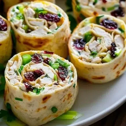 Delicious creamy cranberry chicken wraps ready to be served