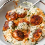 Crispy Cajun Salmon Nuggets on a bed of garlic cream mash