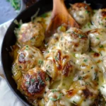 Delicious French onion chicken meatballs served in a savory sauce