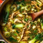 Bowl of Ginger Chicken and Rice Soup with Bok Choy