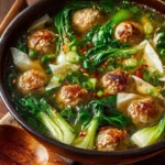 Ginger Chicken Meatball Soup with baby bok choy and crispy wonton strips