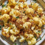 Golden cauliflower topped with toasted garlic breadcrumbs for added flavor.