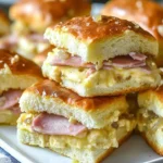 Ham and Swiss Sliders with Dijon Onion Butter on a platter