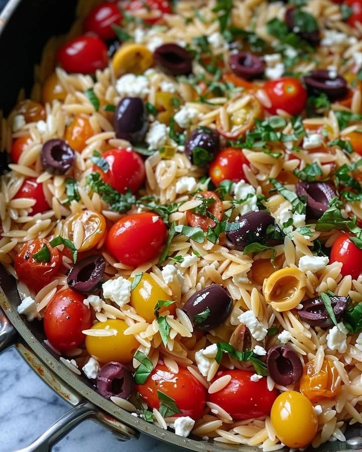 Healthy Mediterranean Orzo Salad with fresh vegetables and herbs