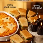 Spooky mummy meatballs wrapped in pastry for Halloween celebration.
