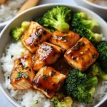 Orange Ginger Salmon Bowls featuring fresh salmon, vegetables, and ginger sauce
