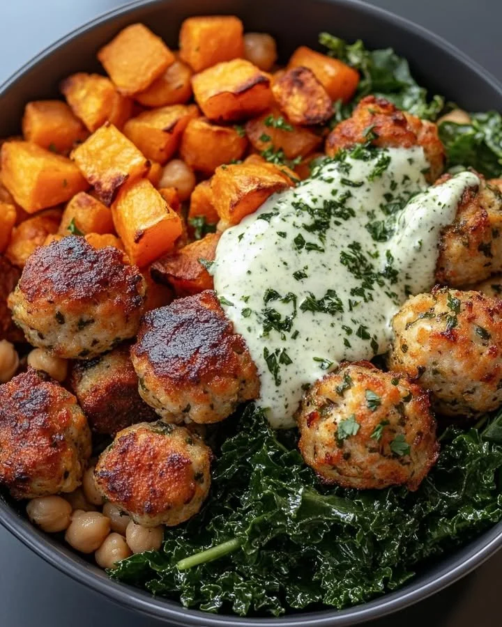 Parmesan roasted chickpeas and sweet potatoes in a delicious bowl with chicken meatballs.