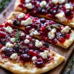 Roasted cranberry and goat cheese flatbread ready to serve