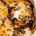 Rustic Italian Beef and Spinach Bake served in a warm dish