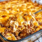 Delicious sour cream noodle bake served in a casserole dish, perfect for family meals