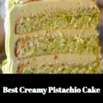 Delicious slice of creamy pistachio cake with nuts on top