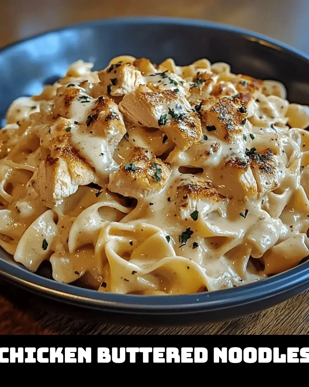 Delicious chicken buttered noodles served on a plate.