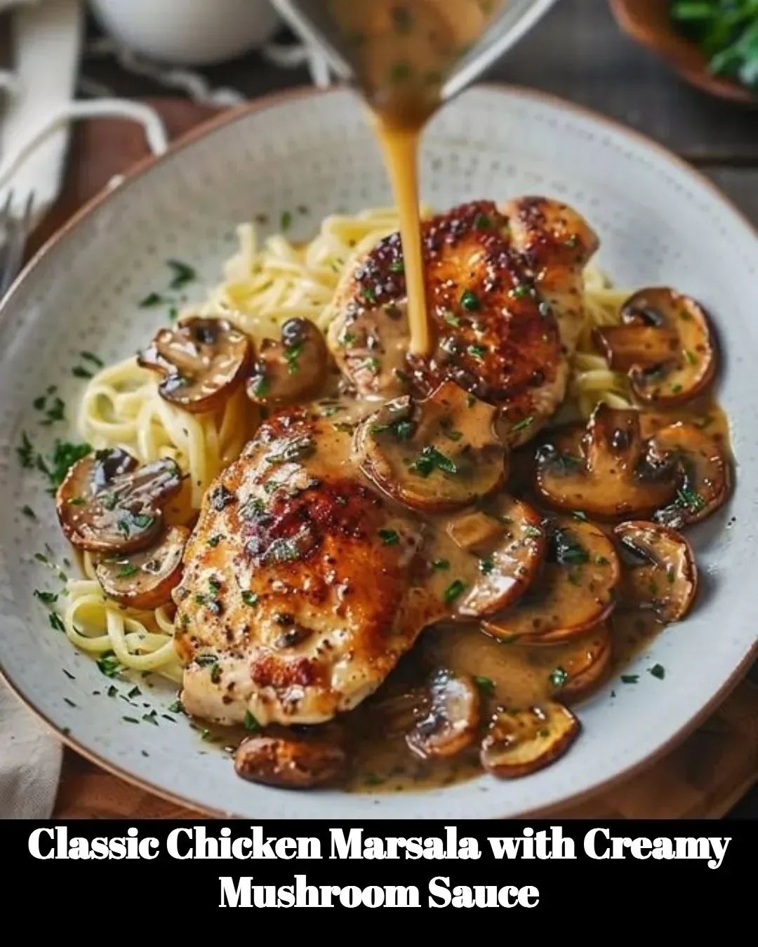 Plate of classic Chicken Marsala topped with creamy mushroom sauce