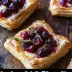 Cranberry brie puff pastry bites served on a platter
