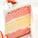 Strawberries and Cream Cheesecake Cake with fresh strawberries and cream cheese frosting