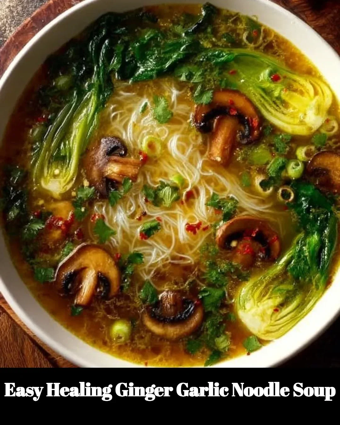 Bowl of Easy Healing Ginger Garlic Noodle Soup with fresh ingredients