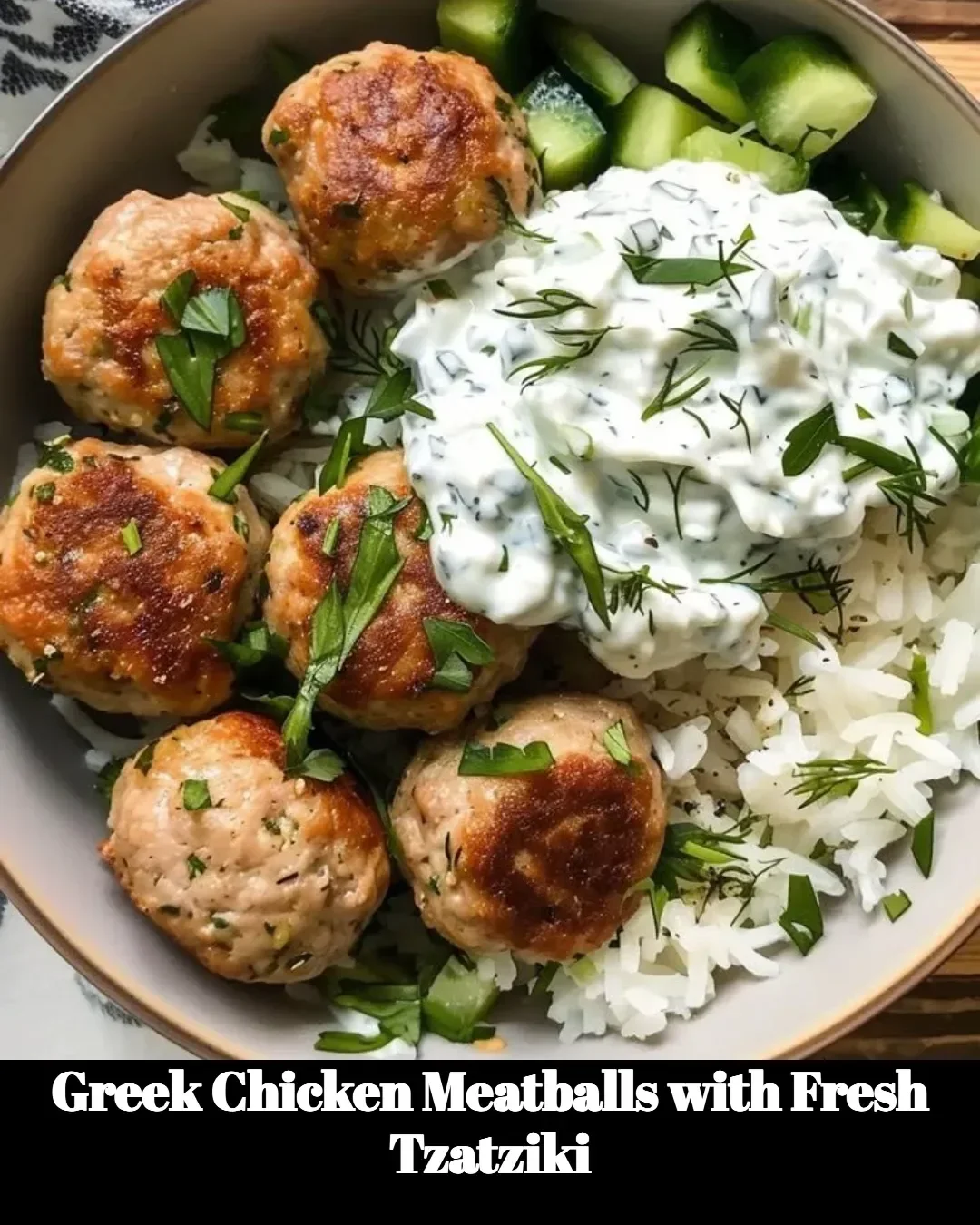 Greek chicken meatballs served with fresh tzatziki sauce on a plate