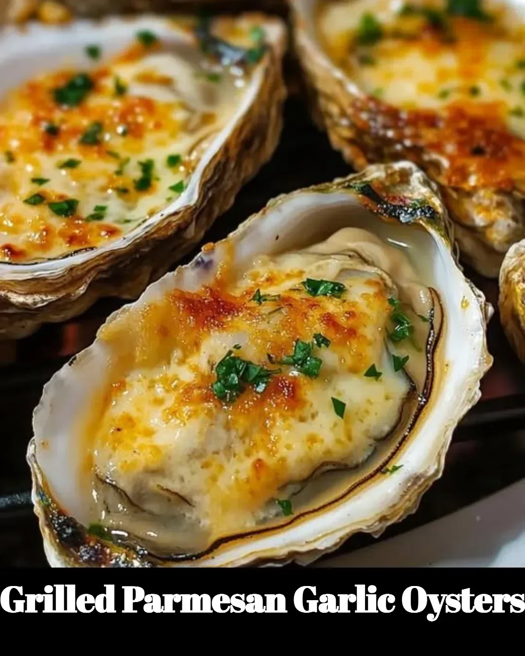Delicious Grilled Parmesan Garlic Oysters served on a plate