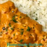 Delicious homemade butter chicken served with rice and naan bread