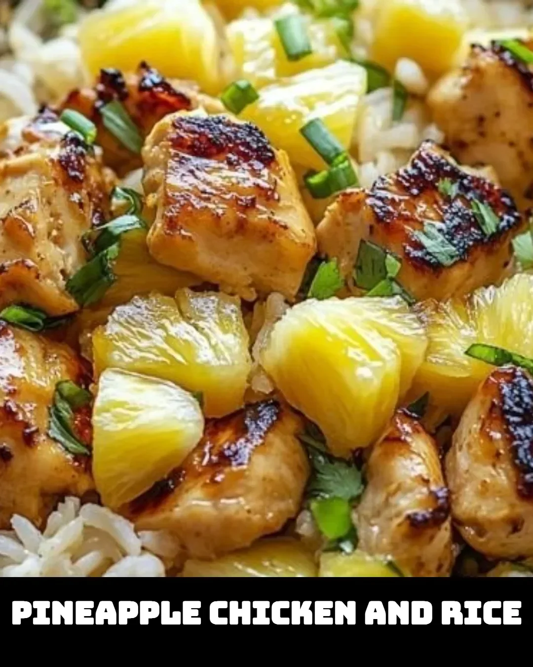 Delicious plate of pineapple chicken served with rice and garnished with green onions.