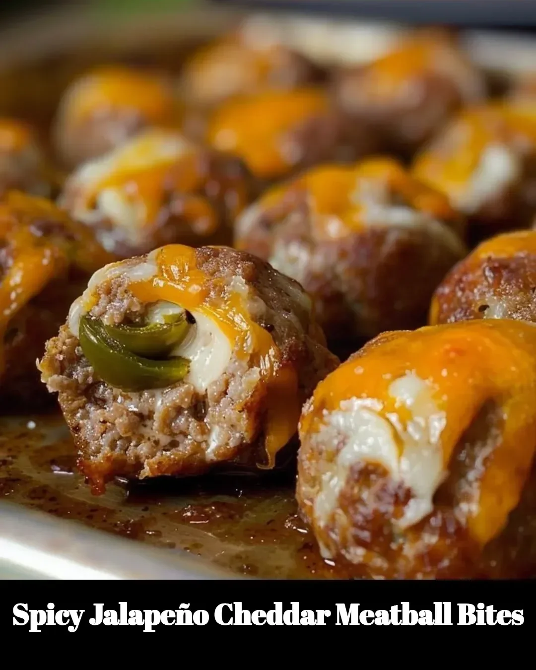 Plate of spicy jalapeño cheddar meatball bites garnished with herbs