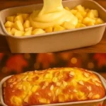 Delicious Apple Yogurt Cake topped with fresh apple slices and yogurt drizzle.