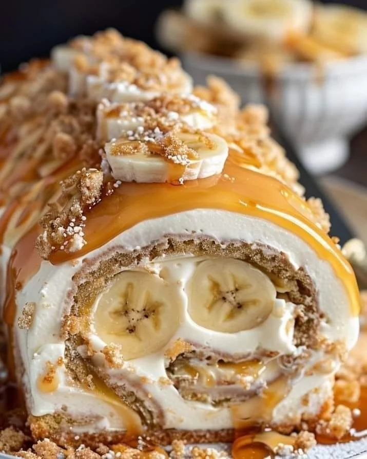 Delicious Banana Caramel Roulade dessert topped with creamy caramel sauce