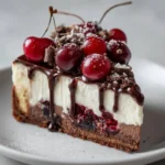 Decadent Black Forest Cheesecake with layers of chocolate and cherries